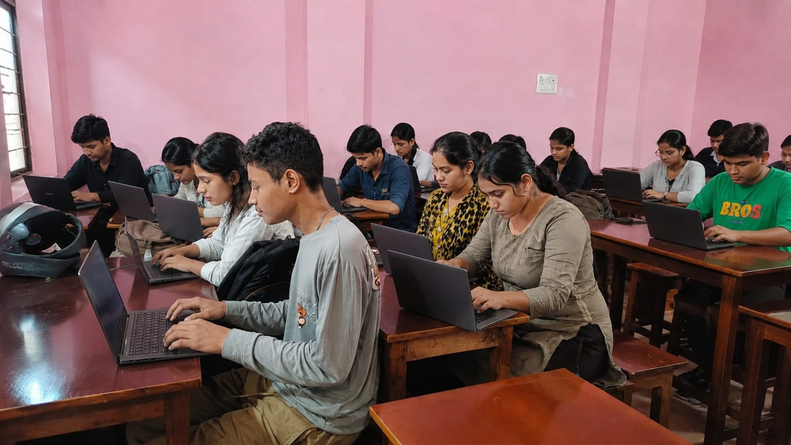 Students learning on laptops in our digital literacy program